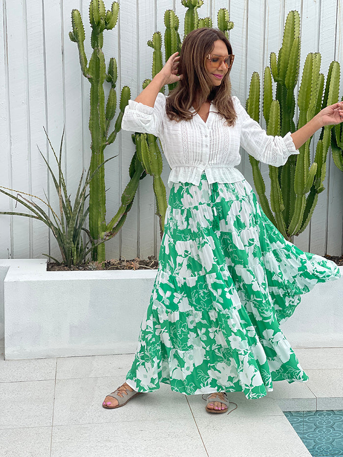 Green and white top skirt outfit