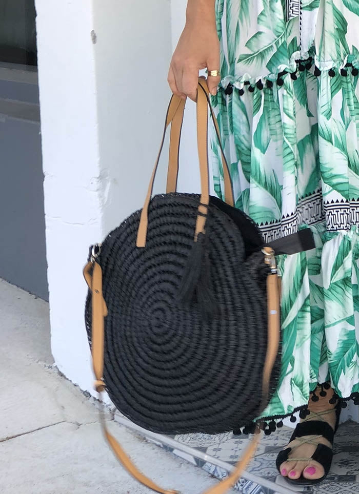 Black round store woven bag